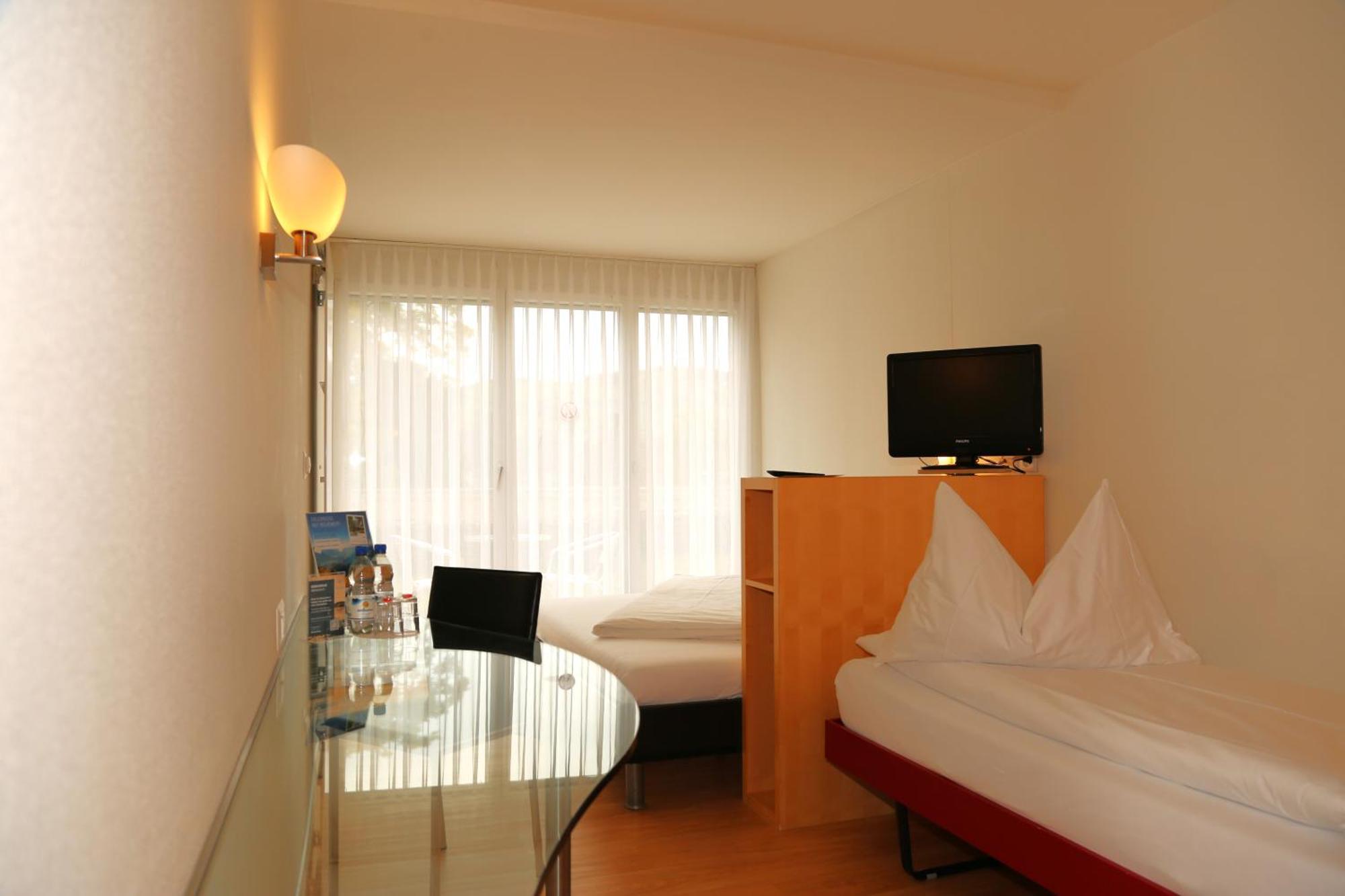 Hotel Seaside Spiez Extérieur photo